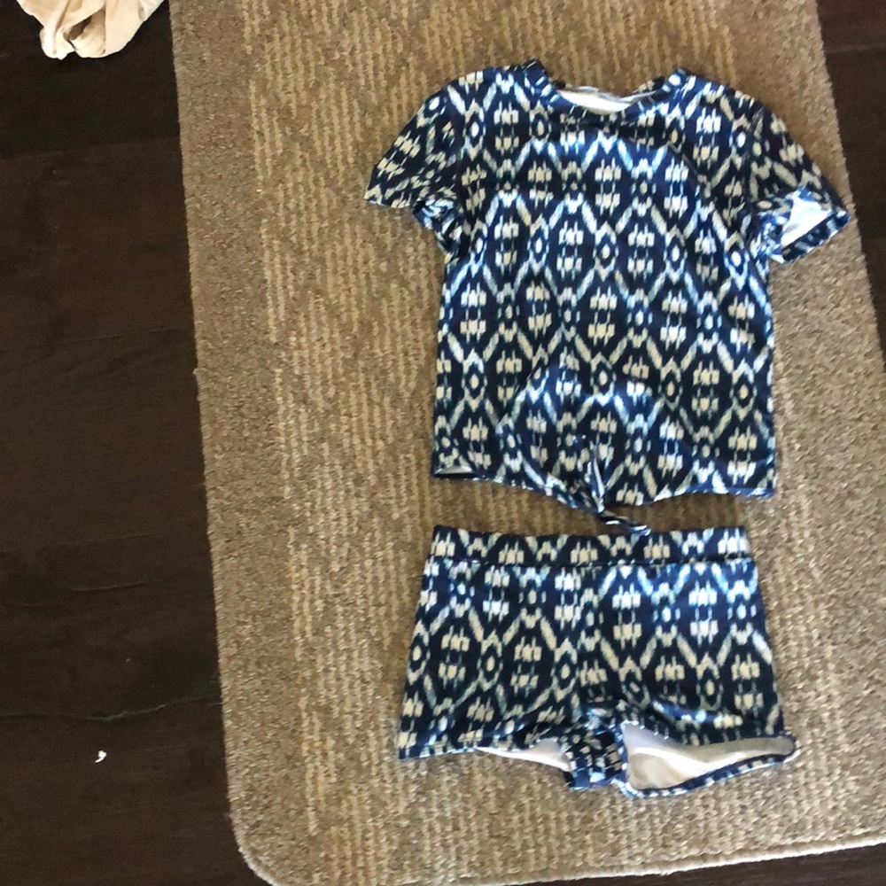 Blue two piece blue swim suit knot in front